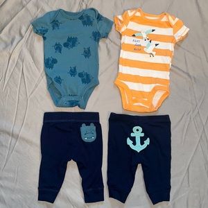 Baby boy clothing sets. 2 outfits, 4 pieces all together. $10 for both.